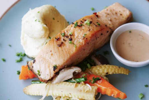 tasty salmon and vegetable on plate ,