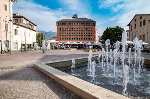 terni,italy september 29 2021:terni piazza europa with the fountain and the municipal market