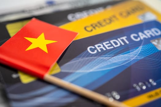 Vietnam flag on credit card. Finance development, Banking Account, Statistics, Investment Analytic research data economy, Stock exchange trading, Business company concept.