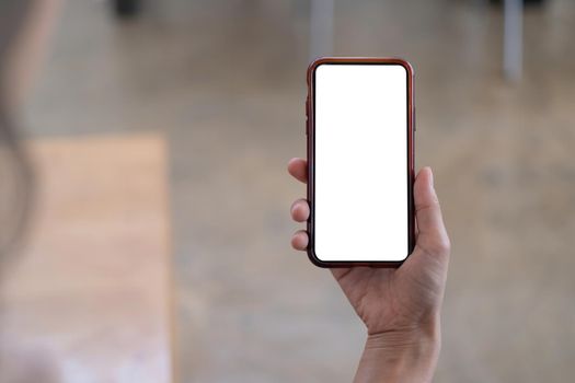 A Woman excited surprise and showing cell phone screen. Blank screen for your advertising