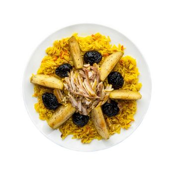 Traditional oriental pilaf with meat in a plate on a white background. Top view. Isolated