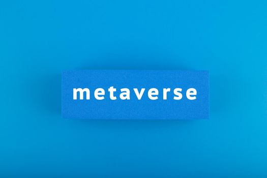 Metaverse modern minimal concept in blue colors. Written metaverse single word on blue rectangle against blue background. Future technologies. 