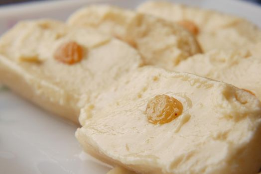 close up of indian sweet in a bowl on table