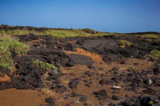 Characteristic view of lava stones of Linosa, Sicily