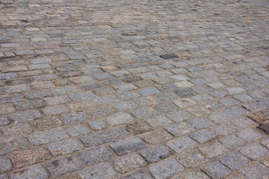 A close up of a brick road super in old town