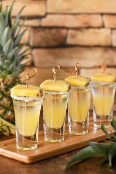 Double shots of tropical tequila with pineapple juice. This is definitely going to be a great party for Cinco de Mayo!