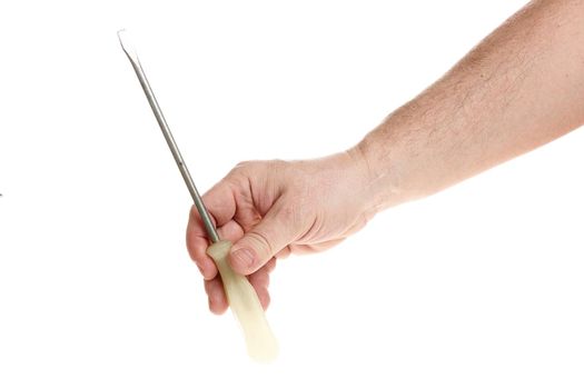 Hand holds a screwdriver on a white background, a template for designers. Close up