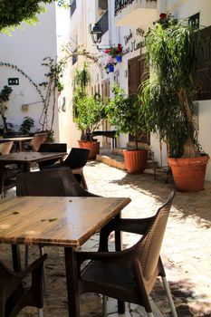 Mojacar, Almeria, Spain- September 8, 2021: Bar terrace in the town hall square in Mojacar on a sunny day of Summer.