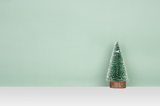 Christmas tree in holiday for decoration on desk, ornament for merry Christmas on table, xmas and festive for celebration, copy space, season and event.