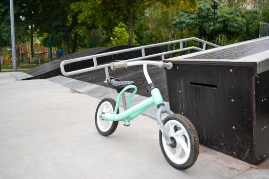 skatepark ramps in the park on autumn. High quality photo