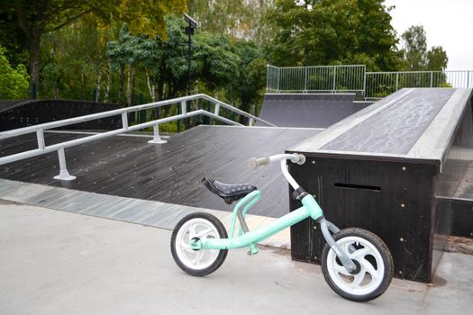 skatepark ramps in the park on autumn. High quality photo