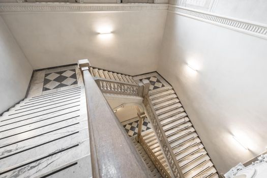 TURIN, ITALY - CIRCA MAY 2021: luxury staircase made of marble in an antique Italian palace