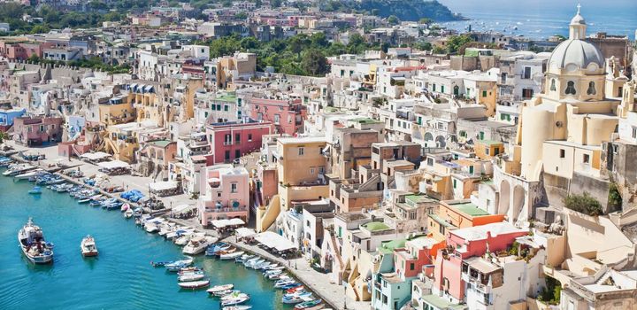 PROCIDA, ITALY - CIRCA AUGUST 2020: panoramic view of the mediterranean Italian island close to Naples in a summer day.