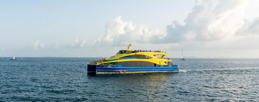 Cancun, Mexico - September 13, 2021: Ultramar ferry sailing with tourists from Cancun to Isla Mujeres