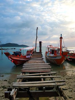 Coast of a tropical island. Boats at sea. Samui , Tailand - 02.21.2020
