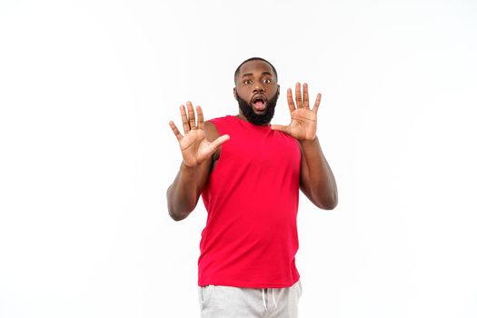 Young sport african american man pleading isolate over grey background