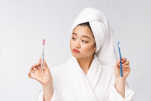 Close up of Smile woman brush teeth. great for health dental care concept, Isolated over white background. asian