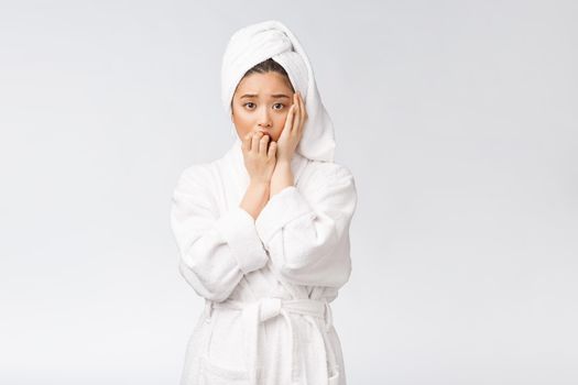 Spa skincare beauty Asian woman drying hair with towel on head after shower treatment. Beautiful multiracial young girl touching soft skin.