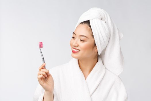 Close up of Smile woman brush teeth. great for health dental care concept, Isolated over white background. asian