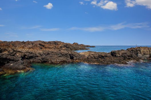 View of the lava beach of Linosa Called Mannarazza, Sicily. Italy