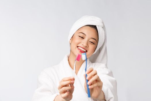 Close up of Smile woman brush teeth. great for health dental care concept, Isolated over white background. asian