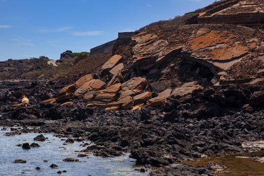 View of the lava beach of Linosa Called Mannarazza, Sicily. Italy