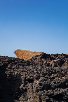 View of the lava rock of Linosa, Sicily. Italy