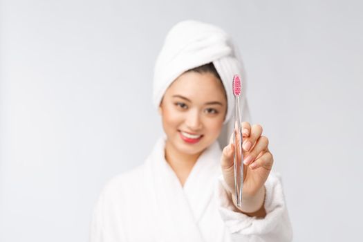 Close up of Smile woman brush teeth. great for health dental care concept, Isolated over white background. asian