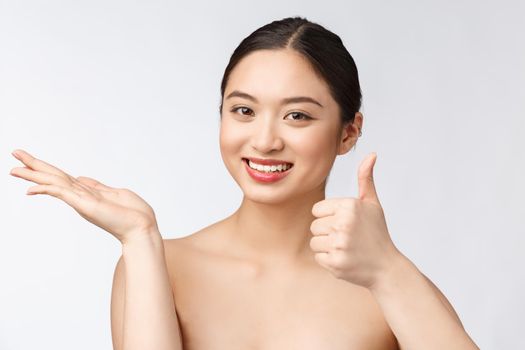 Beautiful smiling woman isolated on white background. Closeup lady portrait looking happy