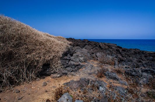 View of the lava beach of Linosa Called Mannarazza, Sicily. Italy