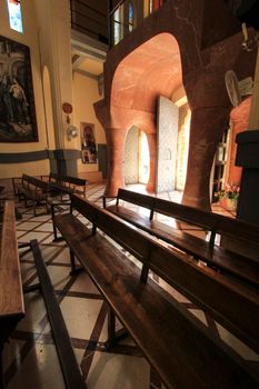 Novelda, Alicante, Spain- September 24, 2021: Details, archs, tower and pictures of Sanctuary of Santa Maria Magdalena on the top of the mountain in Novelda, Alicante, Spain.