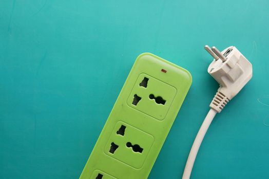 Electrical switch and plug on color background