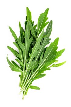 Arugula leaves isolated on white background. Closeup fresh wild rocket leaves on white background top view.