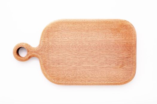 Empty vintage wooden cutting board isolated on white background top view.