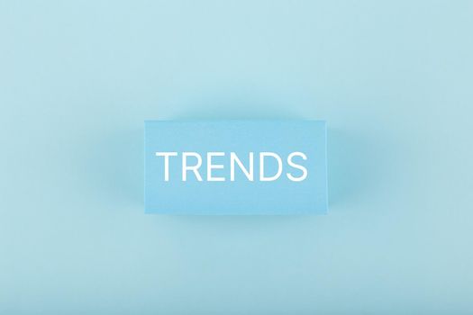 Trends written on rectangles on light blue background. Minimal concept of newest, latest, hot and popular trends 