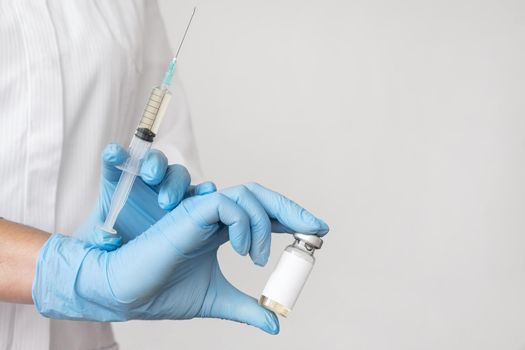 doctor holding syringe with vaccine. Resolution and high quality beautiful photo