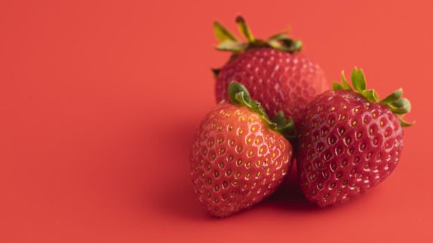 front view three strawberries with copy space. Resolution and high quality beautiful photo