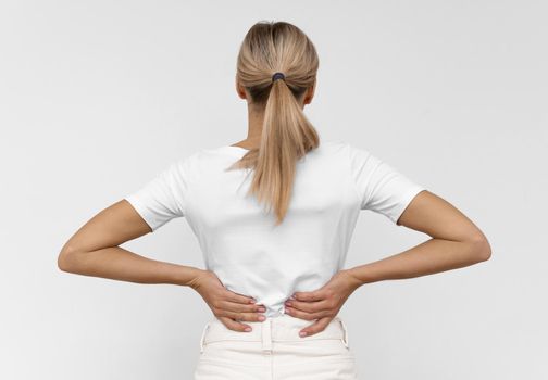 woman with back pain. Resolution and high quality beautiful photo