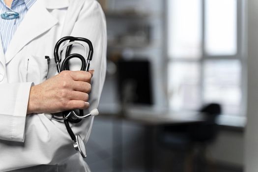 front view female doctor holding stethoscope with copy space. Resolution and high quality beautiful photo