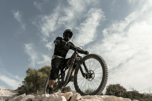 man riding mountain bike low angle. Resolution and high quality beautiful photo