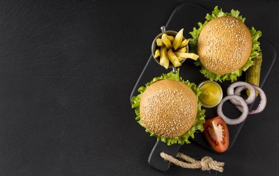 top view burgers fries with pickles copy space. Resolution and high quality beautiful photo