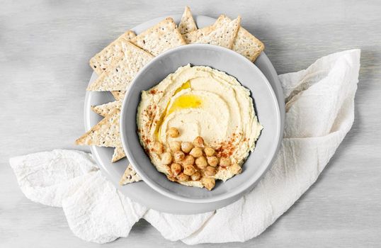 top view hummus with chickpeas nacho chips. Resolution and high quality beautiful photo