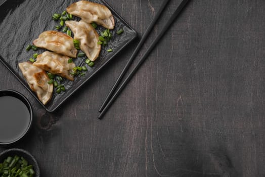 flat lay asian dumplings dish slate with copy space. Resolution and high quality beautiful photo