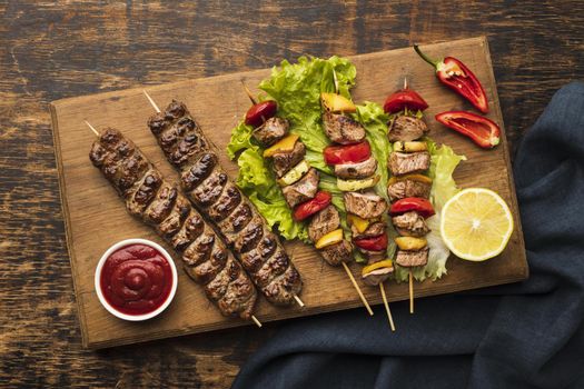 top view chopping board with delicious kebab lemon. Resolution and high quality beautiful photo
