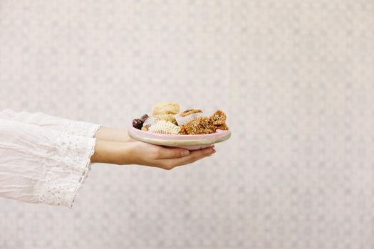 hands holding plate arab food. Resolution and high quality beautiful photo