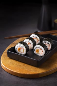 maki sushi rolls with chopsticks. Resolution and high quality beautiful photo