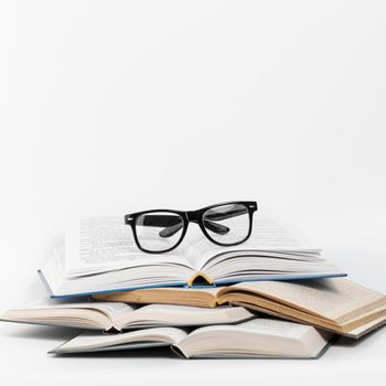 front view open books with glasses. Resolution and high quality beautiful photo