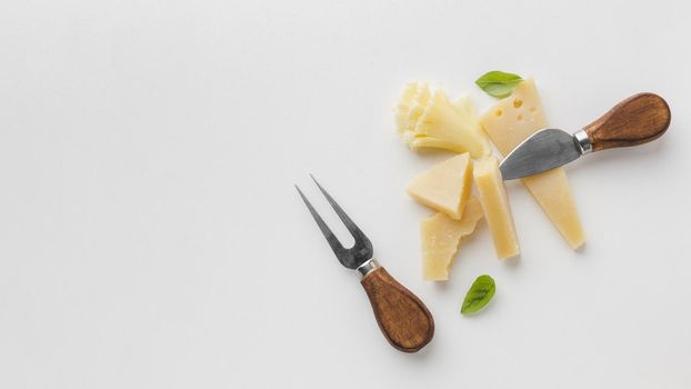 flat lay assortment gourmet cheese cheese knives with copy space. Resolution and high quality beautiful photo