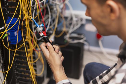 engineer man testing optical fiber. Resolution and high quality beautiful photo