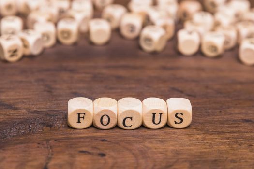 focus letters written wooden cubes table. Resolution and high quality beautiful photo